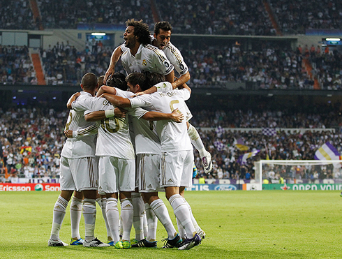 Cristiano Ronaldo and Real Madrid players hug and party, at the Santiago Bernabéu in 2012