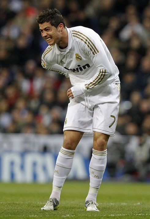 Cristiano Ronaldo looking injured and visibly with pains, in Real Madrid vs Racing Santander, for La Liga in 2012