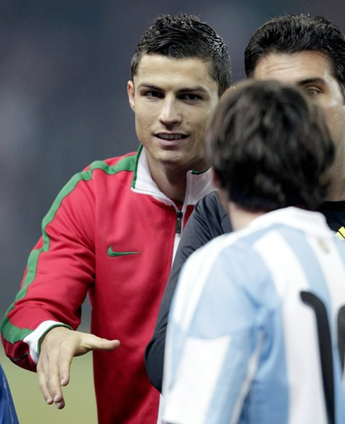 Cristiano Ronaldo saluting Lionel Messi in a Portugal vs Argentina match, in 2011-2012