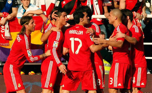 Cristiano Ronaldo and Real Madrid players celebrating his back heel goal in La Liga, in 2012