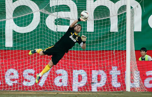 Iker Casillas flying to make a great save and stop for Real Madrid, in 2012