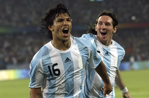 Sergio Kun Aguero and Lionel Messi, celebrating a goal together, for Argentina