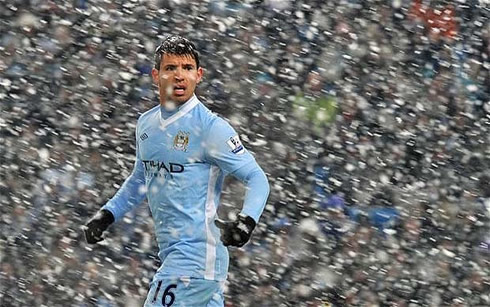 Sergio Kun Aguero playing for Manchester City in 2012, with a snow storm falling