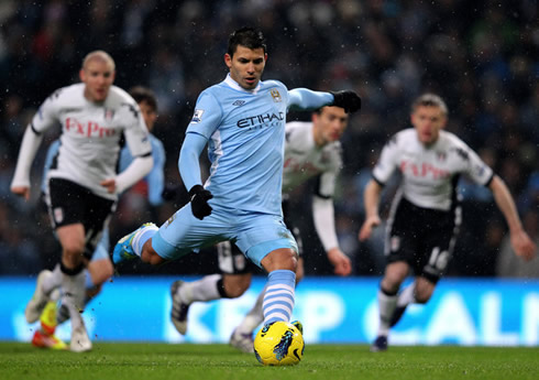Sergio Kun Aguero scoring a penalty kick with rain falling, in a Manchester City game in 2011/2012