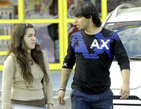 Sergio Kun Aguero showing his arm tatoo, while being with his wife/girlfriend, Giannina Maradona