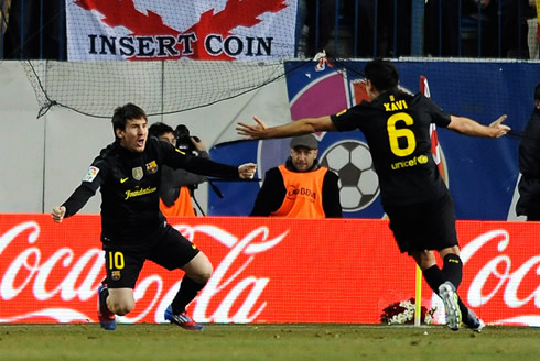 Messi celebrating a goal with Xavi, in Barcelona 2012
