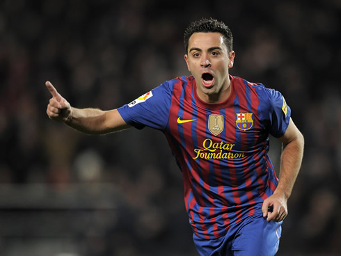 Xavi celebrating a Barcelona goal at the Camp Nou, in 2012