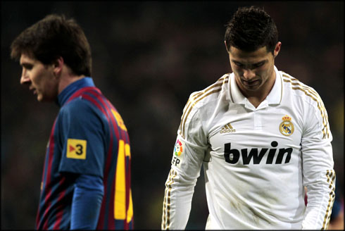 Cristiano Ronaldo and Lionel Messi, in a match between Real Madrid vs Barcelona, in 2011-2012
