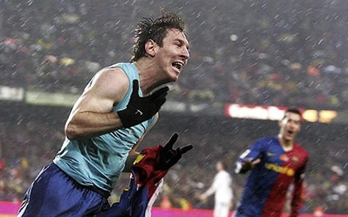 Lionel Messi shirtless, showing his biceps as he celebrates Barcelona goal in 2012