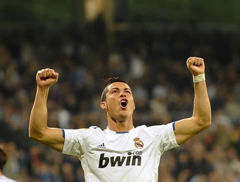 Cristiano Ronaldo raising his arms to celebrate a goal for Real Madrid, in 2010