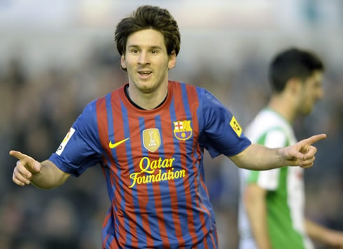 Lionel Messi celebrating his 50th goal for Barcelona in the 2011-2012 season