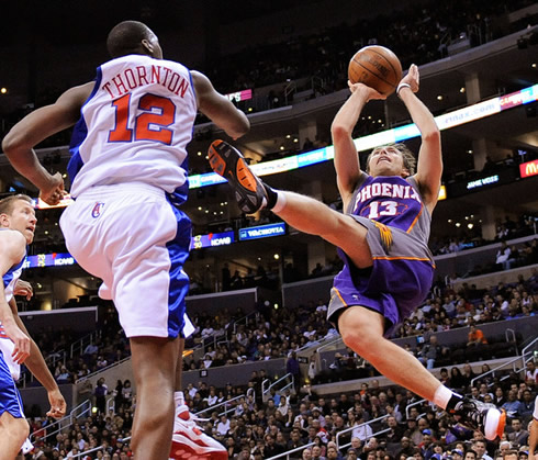 Steve Nash perfect basketball fade away jump at an NBA game