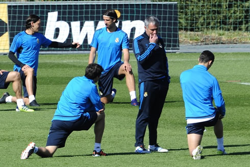 Cristiano Ronaldo and Kaká, listening to José Mourinho at a Real Madrid training and practice session in 2012