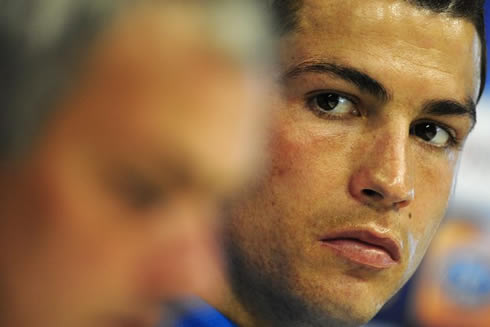 Cristiano Ronaldo looking carefully at José Mourinho, in 2012