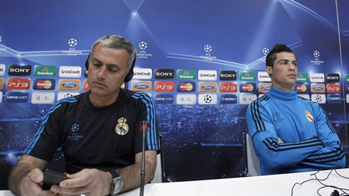 Cristiano Ronaldo sitting next to José Mourinho, at a Real Madrid press conference for the UEFA Champions League, in 2012