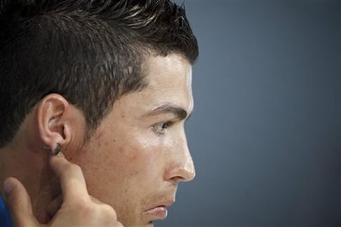 Cristiano Ronaldo thoughtful, touching his earing