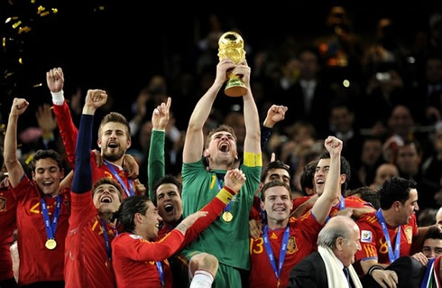 Iker Casillas lifting and raising the World Cup 2010 trophy for Spain