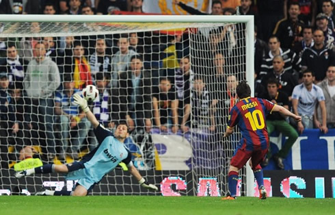 Iker Casillas preventing and stopping Lionel Messi from scoring, in Barcelona vs Real Madrid