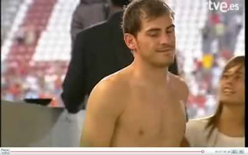 Iker Casillas shirtless, showing he has no body muscles, specially on his chest