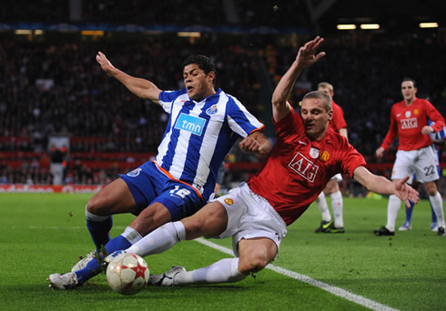 Nemanja Vidic in a great defensive tackle against Hulk, in Manchester United vs Porto for the UEFA Champions League