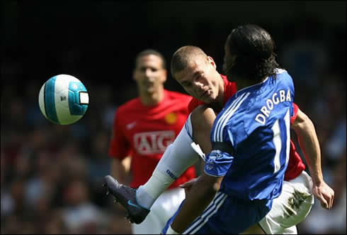 Nemanja Vidic vs Didier Drogba, taking a knee on his chin during a Manchester United vs Chelsea English Premier League game
