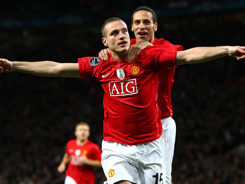 Nemanja Vidic with Rio Ferdinand, celebrating a goal for Manchester United, in 2011-2012