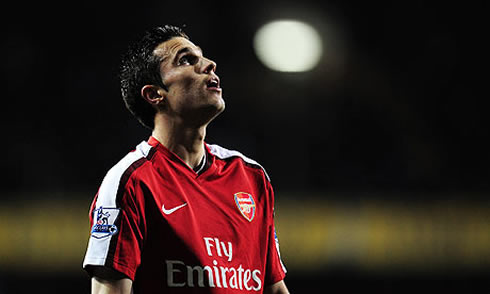 Robin van Persie looking at the sky, during Arsenal game in 2012