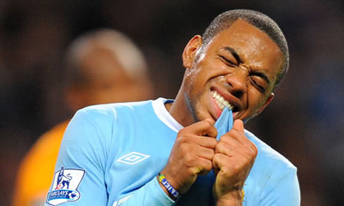 Robinho biting his Manchester City jersey