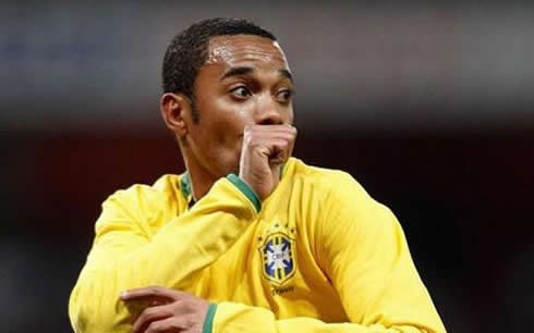 Robinho trademark celebration after scoring a goal for Brazil, as if he was a baby with his thumb in his mouth