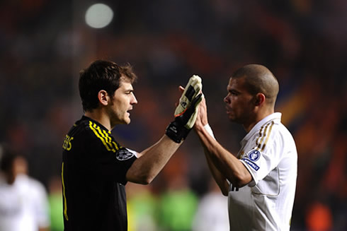Casillas and Pepe encouraging each other, before a Real Madrid game starts in 2012