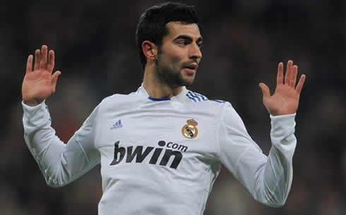 Raul Albiol putting his hands up, as if he was being caught by the police, in Real Madrid 2012