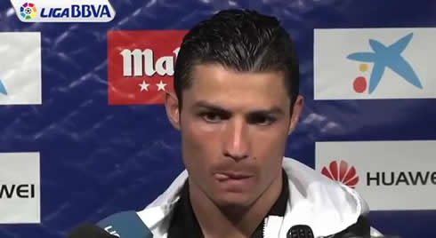 Cristiano Ronaldo licking his lips with his tongue