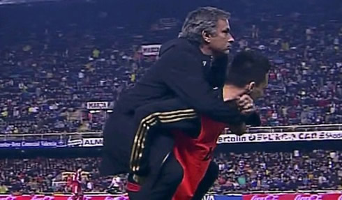 Callejón being mounted by José Mourinho, as if he was a horse, in goal celebrations during the Valencia vs Real Madrid game, in 2011-2012