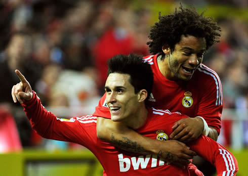 Callejón with Marcelo, playing for Real Madrid in a new red jersey