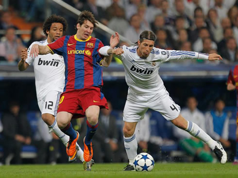 Sergio Ramos elbowing and shoving Lionel Messi, in Barcelona vs Real Madrid