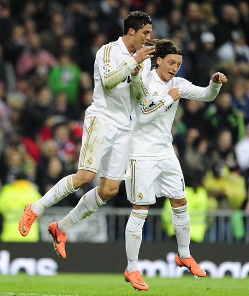 Cristiano Ronaldo goal celebration with Mesut Ozil, jumping shoulder to shoulder in NBA style, in 2012