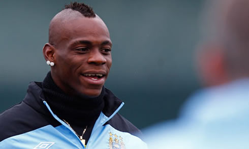 Mario Balotelli original haircut, with hair only at the center of his head