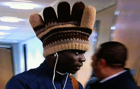 Mario Balotelli wearing a funny and strange hat