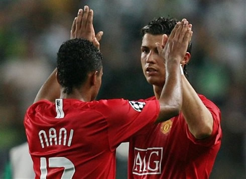 Cristiano Ronaldo and Nani touching hands in Manchester United