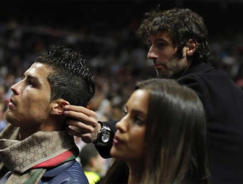 Esteban Granero playing with Cristiano Ronaldo earrings, while Irina Shayk pays attention to the game