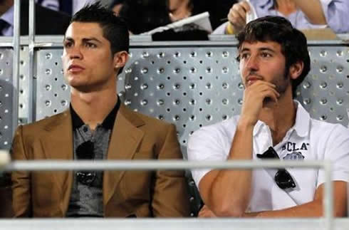 Cristiano Ronaldo watching a tennis match with Esteban Granero at his side