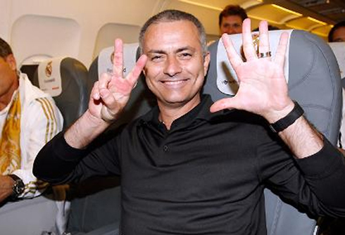 José Mourinho making a hand gesture in the airplane, after winning his 7th domestic league
