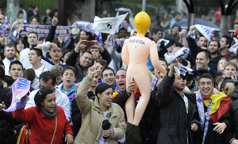 Real Madrid fans party in the Cibeles, mocking Shakira with an inflatable doll, in 2012