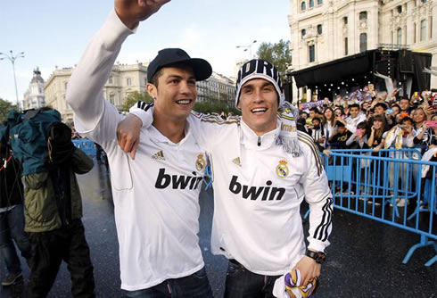 Cristiano Ronaldo wearing a black, Nike cap, with José Callejón, in the Cibeles 2012