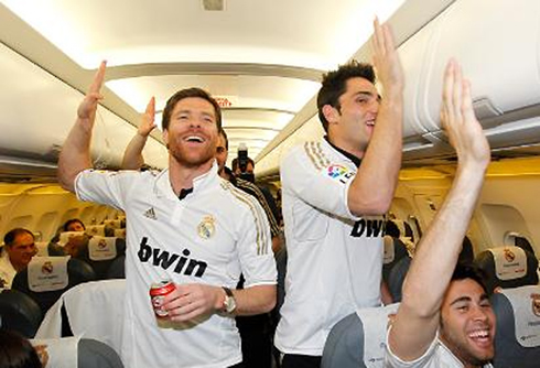 Xabi Alonso leading Real Madrid celebrations in the airplane, in 2012
