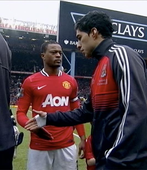 Luis Suárez and Patrice Evra incident, when they did not salude/greet and handshake each other, when teams were lined up, before a Manchester United vs Liverpool game, in 2012