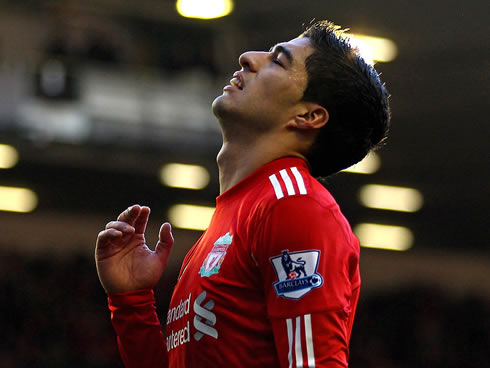 Luis Suárez reaction putting his head back, during a game for Liverpool in 2012