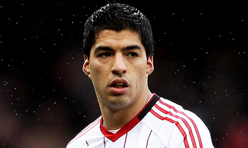 Luis Suárez in a Liverpool white jersey, in 2012