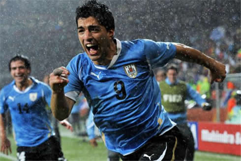 Luis Suárez running to celebrate a goal for Uruguay, in the 2010 World Cup