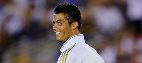 Cristiano Ronaldo looking tanned and smiling in a Real Madrid game on the 2011 pre-season